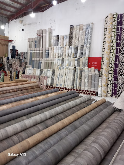خياط الثوب الملون - Saudi Arabia|Tanomah 62715|King Faisal Rd|W5HV+Q73